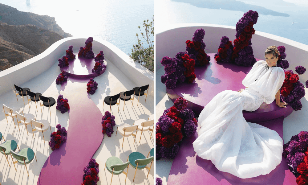 Wedding aisle in Greece adorned with deep burgundy florals, creating a romantic and dramatic path